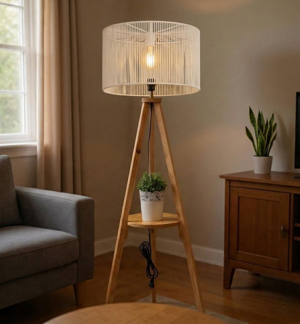 A floor lamp made of pine wood with a macrame shade.