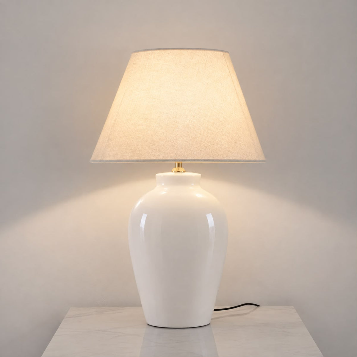 White pottery table lamp with an off-white shade.30CM*25CM