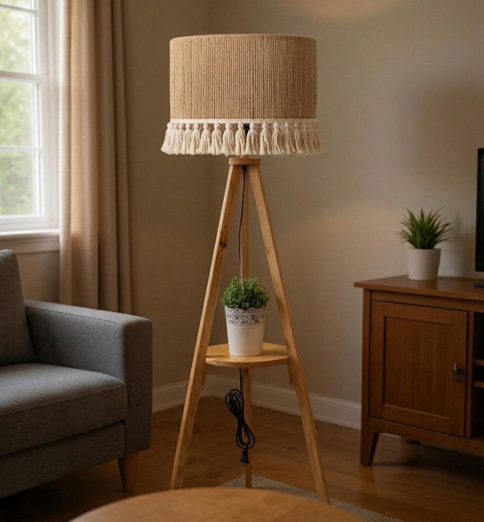 A floor lamp made of pine wood with a macrame shade.