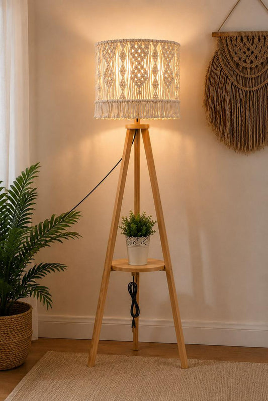A floor lamp made of pine wood with a macrame shade.